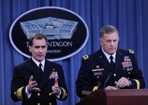 (140923)-- WASHINGTON D.C., Sept. 23, 2014 (Xinhua) -- Pentagon Press Secretary John Kirby (L) speaks during a briefing at the Pentagon in Washington D.C., capital of the United States, Sept. 23, 2014. The airstrikes on the Islamic State (IS) ...