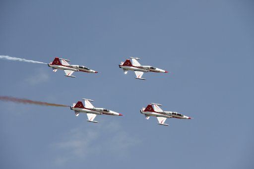 (140830) -- ANKARA, Aug. 30, 2014 (Xinhua) -- The aerobatic demonstration team of the Turkish Air Force "Turkish Stars" perform during a military parade marking the 92nd anniversary of the Victory Day in Ankara, capital of Turkey, Aug. 30, 2014. ...