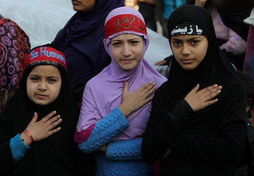 (141101) -- SRINAGAR, Nov. 1, 2014 (Xinhua) -- Kashmiri Shiite Muslim girls take part in Muharram procession in Srinagar, summer capital of Indian-controlled Kashmir, Nov. 1, 2014. The month of Muharram, marking the Islamic New Year, is a sacred ...