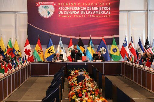 (141013) -- AREQUIPA, Oct. 13, 2014 (Xinhua) -- Peruvian President Ollanta Humala (C) delivers a speech during the opening ceremony of the 11th Conference of Defense Ministers of the Americas in Arequipa, Peru, on Oct. 13, 2014. (Xinhua\/Norman ...