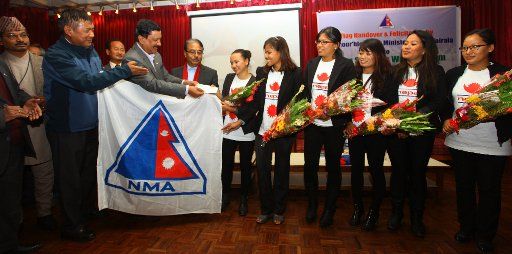(141208) -- KATHMANDU, Dec. 8, 2014 (Xinhua) -- Seven Summits Women Team receive farewell before their expedition to Mount Vinson Massif in Antarctica during a farewell and flag handover ceremony in Kathmandu, Nepal, Dec. 8, 2014. The Women team had ...