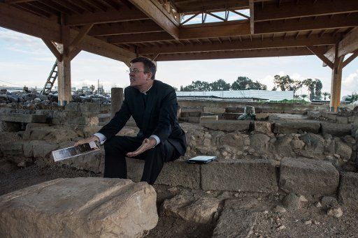 (141214) -- JERUSALEM, Dec. 14, 2014 (Xinhua) -- Fr. Eamon Kelly, Vice Charge of Pontifical Institute Notre Dame of Jerusalem Center, introduces the Migdal Synagogue dated to the first century A.D., the first synagogue discovered in Galilee and one ...