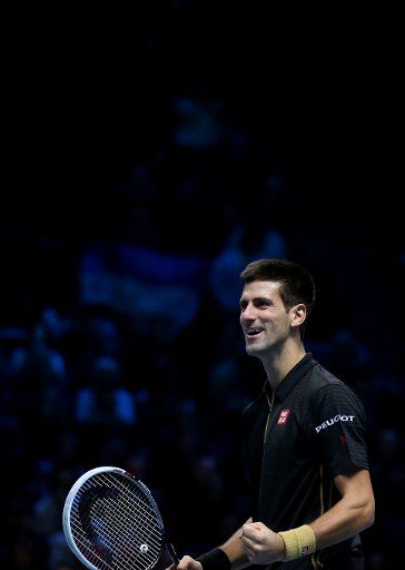 (141115) -- LONDON, Nov. 15, 2014 (Xinhua) -- Novak Djokovic of Serbia reacts after the ATP World Tour Finals Group match against Tomas Berdych of the Czech Republic in London, Britain, on Nov. 14, 2014. Djokovic won 2-0. (Xinhua\/Han Yan)