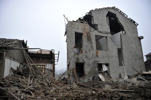 (141122) -- ZHANGJIAJIE, Nov. 22, 2014 (Xinhua) -- Photo taken on Nov. 22, 2014 shows the site where a blast occurred at Dayongqiao community of Yongding District, in Zhangjiajie City of central China\