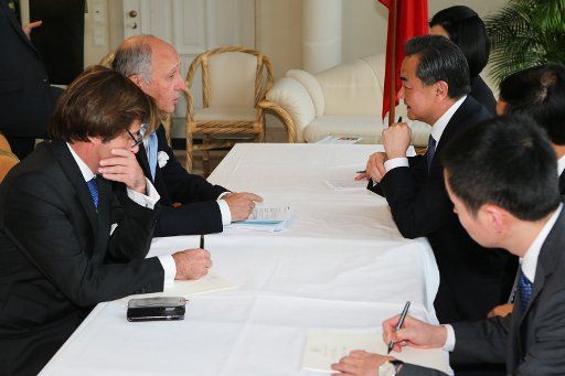 (141124) -- VIENNA, Nov. 24, 2014 (Xinhua) -- Chinese Foreign Minister Wang Yi (2nd, R) meets with French Foreign Minister Laurent Fabius (2nd, L) at Palais Coburg, the venue of nuclear talks in Vienna, Austria, Nov. 24, 2014. (Xinhua\/Zhang Fan) (...