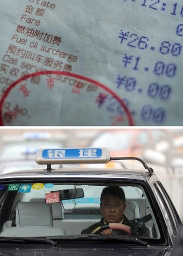 (150114) -- BEIJING, Jan. 14, 2015 (Xinhua) -- Upper photo shows a taxi invoice which includes 1 yuan fuel surcharge and lower photo shows a taxi in Beijing, capital of China, Jan. 14, 2015. Beijing will stop charging the taxi fuel surcharge ...