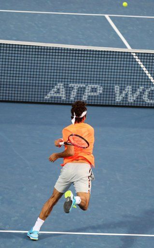 (150227) -- DUBAI, Feb. 27, 2015 (Xinhua) -- Roger Federer of Switzerland returns the ball to Borna Coric of Croatia during their ATP Dubai Duty Free Tennis Championships semi final match in Dubai, on Feb. 27, 2015. Federer won 2-0. (Xinhua\/Li Zhen)