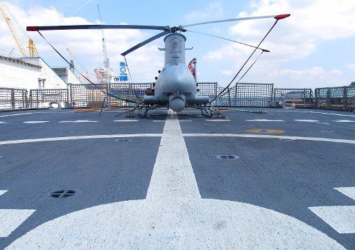 (150217)-- SINGAPORE, Feb. 17, 2015(Xinhua)-- The image taken in Singapore shows an MQ-8B Fire Scout Unmanned Aerial System (UAS) on the rear deck of the USS Fort Worth at Sembawang Wharves during a port of call in Singapore on February 17, 2015. ...