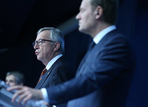 (150320) -- BRUSSELS, March 20, 2015 (Xinhua) -- European Commission President Jean-Claude Juncker (L) and European Council President Donald Tusk attend a press conference after the European Union (EU) summit at EU headquarters in Brussels, Beglium, ...