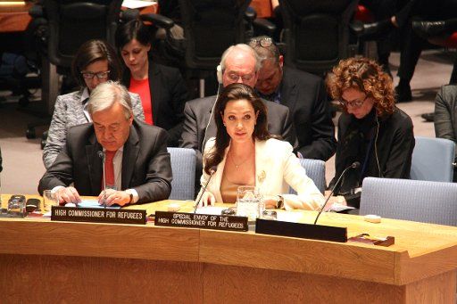 (150424) -- NEW YORK, April 24, 2015 (Xinhua) -- Angelina Jolie Pitt (R, front), special envoy of the United Nations High Commissioner for Refugees, delivers a speech at a Security Council meeting on the situation in the Middle East in New York, the ...