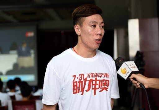 (150731) -- SHENYANG, July 31, 2015 (Xinhua) -- A student from Shenyang Sport University receives an interview after Beijing, together with its neighbor city Zhangjiakou, won the bid to host the 2022 Olympic Winter Games, in Shenyang, capital city ...