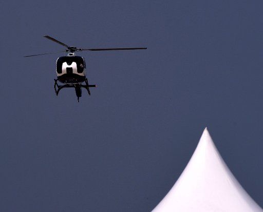 (150820) -- SHENYANG, Aug. 20, 2015 (Xinhua) -- A helicopter shows aerobatics at the opening ceremony of the 2015 Shenyang Faku International Flight Convention, in Faku County of Shenyang, capital of northeast China\