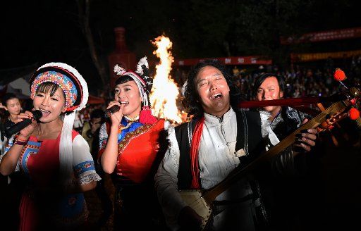 (150910) -- JIANCHUAN, Sept. 10, 2015 (Xinhua) -- Villagers of Bai ethnic group gather to sing around a bonfire at a song festival in Jianchuan County of Dali Bai Autonomous County, southwest China\
