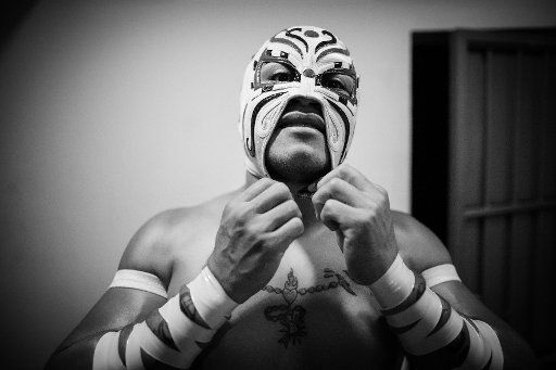 (150918) -- MEXICO CITY, Sept. 18, 2015 (Xinhua) -- Luchador Triton prepares prior to the lucha libre at Arena Mexico in Mexico City, capital of Mexico, on Sept. 8, 2015. Lucha Libre is authentic Mexican free wrestling and features strong men in ...