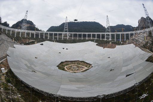 (151216) -- PINGTANG, Dec. 16, 2015 (Xinhua) -- Photo taken on Dec. 16, 2015 shows the assembly site of the single-aperture spherical telescope "FAST" in Pingtang County, southwest China\