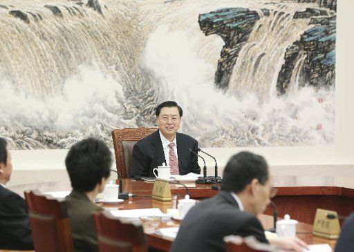 (160215) -- BEIJING, Feb. 15, 2016 (Xinhua) -- Zhang Dejiang (back), chairman of the Standing Committee of China\
