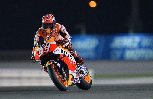 (160320) -- DOHA, March 20, 2016 (Xinhua) -- Spanish MotoGP rider Marc Marquez of the Repsol Honda Team races during the MotoGP qualifying session of the Grand Prix of Qatar at the Losail International Circuit in Doha, Qatar, on March 19, 2016. ...