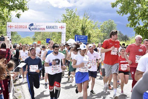(160508) -- TBILISI, May 8, 2016(Xinhua) -- People participate in the 2016 Wings for Life World Run in Kakheti, Georgia, on May 8, 2016. (Xinhua\/Giorgi Induashvili)