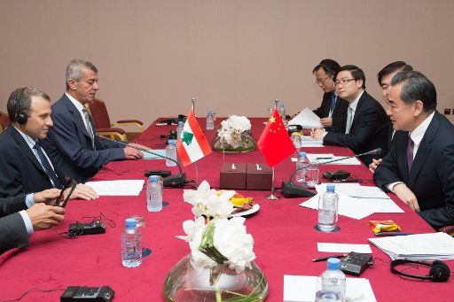 (160512) -- DOHA, May 12, 2016 (Xinhua) -- Chinese Foreign Minister Wang Yi (1st R) meets with his Lebanese counterpart Joubran Bassil (1st L) in Doha, Qatar, May 11, 2016. The two ministers are in the Qatari capital for the 7th Ministerial Meeting ...
