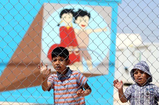(160531) -- ZARQA, May 31, 2016 (Xinhua) -- Syrian children are seen at the Mrajeeb Al Fhood refugee camp, east of the city of Zarqa, Jordan, May 31, 2016. (Xinhua\/Mohammad Abu Ghosh)