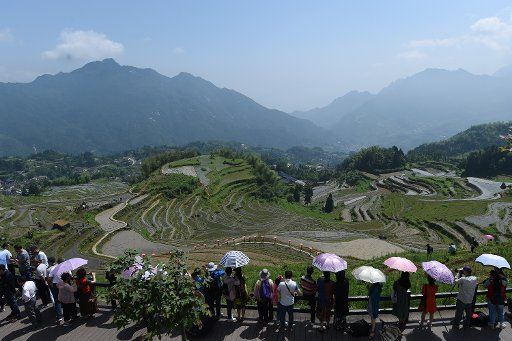 (160605) -- YUNHE, June 5, 2016 (Xinhua) -- Visitors enjoy the scenery of terrace fields in Yunhe County, east China\