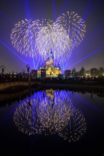 (160617) -- SHANGHAI, June 17, 2016 (Xinhua) -- Fireworks light up the sky during a fireworks show at the Shanghai Disney Resort in Shanghai, east China, June 16, 2016. The Shanghai Disney Resort officially opened on Thursday. (Xinhua\/Zheng ...