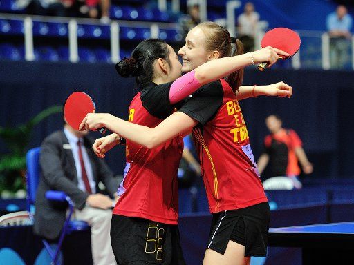 (160718) -- ZAGREB, July 18, 2016 (Xinhua) -- Lisa Lung (L) and Eline Loyen of Belgium celebrate after winning the Junior Girls Doubles final against Adina Diaconu and Andreea Dragoman of Romania at the 2016 European Youth Table Tennis Championships ...