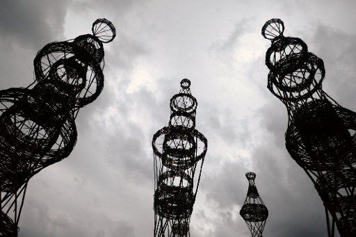 (160724) -- NIKOLA-LENIVETS, July 24, 2016 (Xinhua) -- Art work "The Cage" is displayed during a landscape architecture festival called "Archstoyanie" in Nikola-Lenivets, Russia, July 23, 2016. The annual event held in Nikola-Lenivets outside Moscow ...