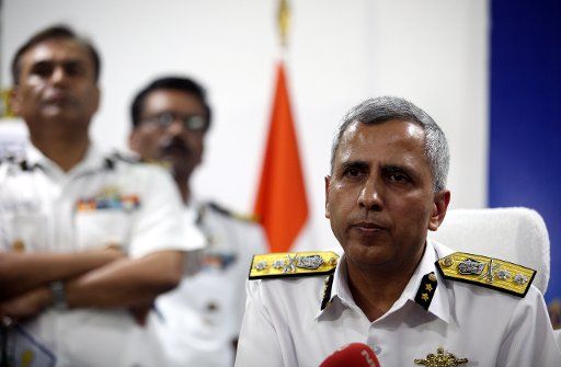(160726) -- CHENNAI (INDIA), July 26, 2016 (Xinhua) -- Indian Coast Guard Commander (East) Inspector General Rajan Bargotra attends a press conference regarding a missing military aircraft, in Chennai, India, on July 25, 2016. An Indian Air Force (...