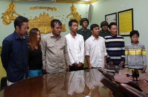 (160923) -- PHNOM PENH, Sept. 23, 2016 (Xinhua) -- Photo taken on Sept. 23, 2016, shows suspects in a grenade explosion in Phnom Penh, capital of Cambodia. Cambodian police on Friday unveiled eight suspects in a Phnom Penh grenade blast on Sept. 6. ...