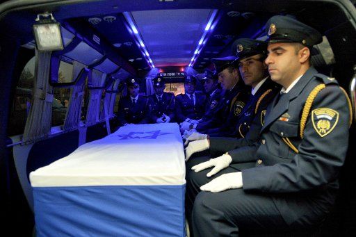 (160929) -- JERUSALEM, Sept. 29, 2016 (Xinhua) -- The coffin of former Israeli President Shimon Peres is seen inside a special army vehicle as it is transferred from Tzrifim army base to Jerusalem, Sept. 29, 2016. Israel\