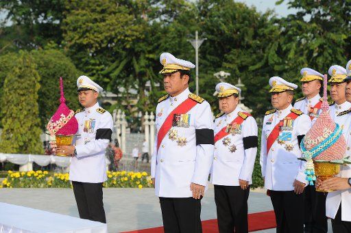 (161210) -- BANGKOK, Dec. 10, 2016 (Xinhua) -- Thai Prime Minister Prayut Chan-o-cha (front C) and other officials attend a ceremony marking the Thai Constitution Day at the Government House in Bangkok, Thailand, Dec. 10, 2016. (Xinhua\/Rachen ...