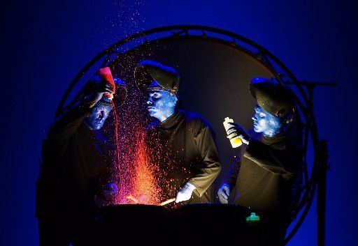 (161117) -- SHANGHAI, Nov. 17, 2016 (Xinhua) -- Members of the Blue Man Group perform at the Culture Square in Shanghai, east China, Nov. 17, 2016. (Xinhua\/Ren Long)(mcg)