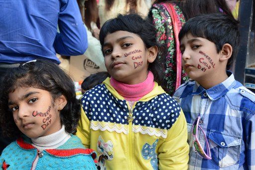 (161119) -- LAHORE, Nov. 19, 2016 (Xinhua) -- Children pose for a photo on the eve of the Universal Children\