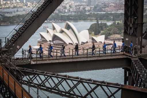 (170118) -- SYDNEY, Jan. 18, 2017 (Xinhua) -- Chinese tourists arrive at the Sydney Harbour Bridge in Sydney, Australia, Jan. 18, 2017. Bridge Climb will officially hold its unique Chinese New Year celebration at the top of the Sydney Harbour Bridge ...