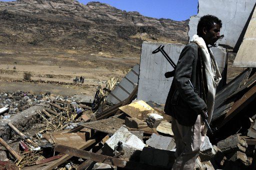 (170216) -- SANAA, Feb. 16, 2017 (Xinhua) -- A man stands on rubble of a funeral house that was hit in airstrike in Arhab district, about 40 km north of Sanaa, capital of Yemen, on Feb. 16, 2017. The Saudi-led coalition fighting Yemeni dominant ...