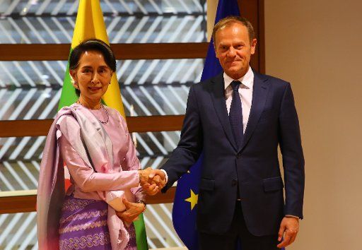 (170502) -- BRUSSELS, May 2, 2017 (Xinhua) -- European Council President Donald Tusk (R) shakes hands with visiting Myanmar State Counselor Aung San Suu Kyi at the Europa building in Brussels on May 2, 2017. (Xinhua\/Gong Bing) (gl)