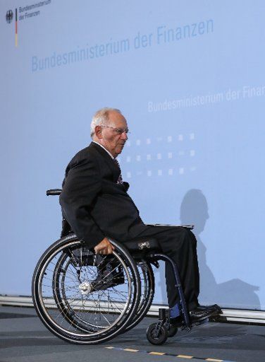 (170511) -- BERLIN, May 11, 2017 (Xinhua) -- German Finance Minister Wolfgang Schaeuble leaves after a press conference in Berlin, capital of Germany, on May 11, 2017. The German government increased its forcast for the tax income of Germany this ...