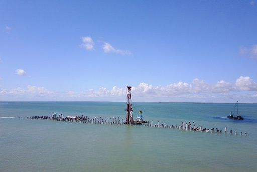 (170513) -- NAIROBI, May 13, 2017 (Xinhua) -- Photo taken on May 10, 2017 by a drone shows a piling site of the Lamu port project, Kenya. The first three berths of the Lamu port project, constructed by China Communications Construction Company (CCCC)...
