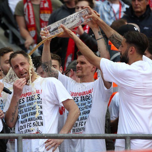 (170521) -- COLOGNE, May 21, 2017 (Xinhua) -- Players of 1. FC Koeln celebrate after winning the Bundesliga match between 1. FC Koeln and FSV Mainz 05 in Cologne, Germany, May 20, 2017. Koeln won 2-0. (Xinhua\/Ulrich Hufnagel)