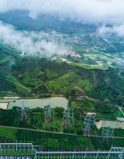 (170623) -- JINHUA, June 23, 2017 (Xinhua) -- Photo taken on June 23, 2017 shows clean hydropower from west China connected to the grid of east China\