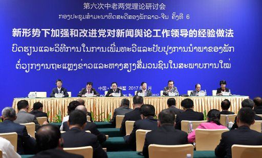 (170623) -- BOAO, June 23, 2017 (Xinhua) -- Representatives attend the sixth theory seminar between the Communist Party of China (CPC) and the Lao People\
