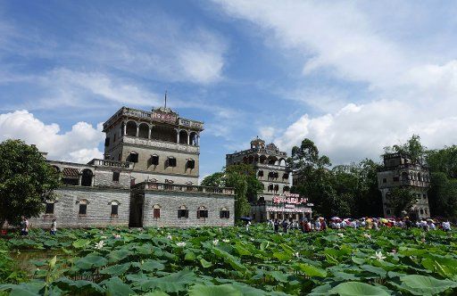 (170611) -- GUANGZHOU, June 11, 2017 (Xinhua) -- People visit the scenic spot of Diaolou in Zili Village, Kaiping City of south China\