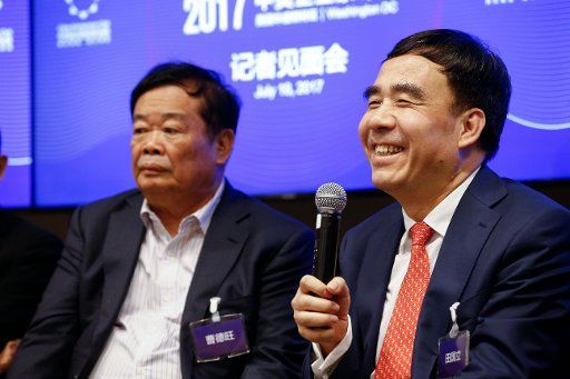 (170719) -- WASHINGTON, July 19, 2017 (Xinhua) -- Tian Guoli (R), chairman of Bank of China, speaks at a press briefing of the China-U.S. Business Leaders Summit in Washington D.C., the United States, on July 18, 2017. A group of prominent ...