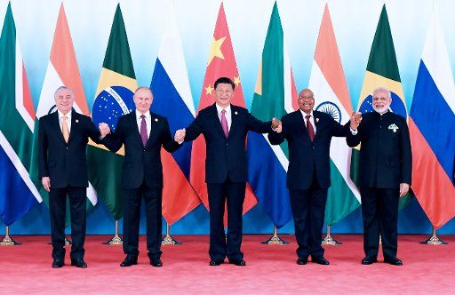 (170904) -- XIAMEN, Sept. 4, 2017 (Xinhua) -- Chinese President Xi Jinping (C) and other leaders of BRICS countries pose for a group photo before the 2017 BRICS Summit in Xiamen, southeast China\