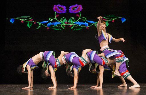(171201) -- TORONTO, Dec. 1, 2017 (Xinhua) -- Dancers perform during the "Cultures of China, Colors of Yunnan" performance at P.C.Ho Theatre in Toronto, Canada, Nov. 30, 2017. (Xinhua\/Zou Zheng) (psw)