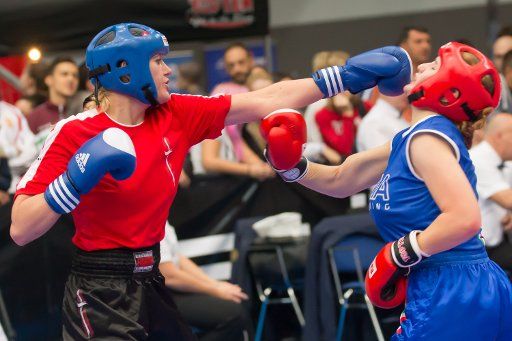 (171111) -- BUDAPEST, Nov. 11, 2017 (Xinhua) -- Gold medalist Katrine Pedersen (L) of Denmark and silver medalist Vittoria Pollone of Italy fight in the 3 KL -70 kg final at the WAKO (World Association of Kickboxing Organizations) World Kick-boxing ...