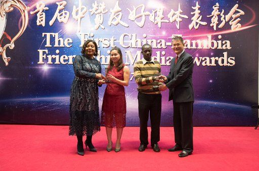 (171212) -- LUSAKA, Dec. 12, 2017 (Xinhua) -- Chinese Ambassador to Zambia Yang Youming (1st R) and Zambia\