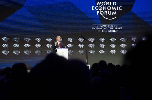(180126) -- DAVOS, Jan. 26, 2018 (Xinhua) -- U.S. President Donald Trump delivers a speech during the 48th annual meeting of the World Economic Forum (WEF) in Davos, Switzerland, on Jan. 26, 2018. U.S. President Donald Trump said Friday that he would always put America first when it came to trade, but "America First" does not mean America alone. (Xinhua\/Xu Jinquan)(rh)
