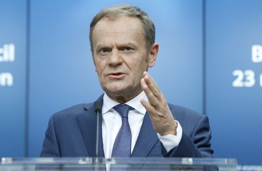(180323) -- BRUSSELS, March 23, 2018 (Xinhua) -- European Council President Donald Tusk attends a news conference with European Commission President Jean-Claude Juncker (not seen) after the spring EU Summit at EU headquarters in Brussels, Belgium, early on March 23, 2018. (Xinhua\/Ye Pingfan)(yk)